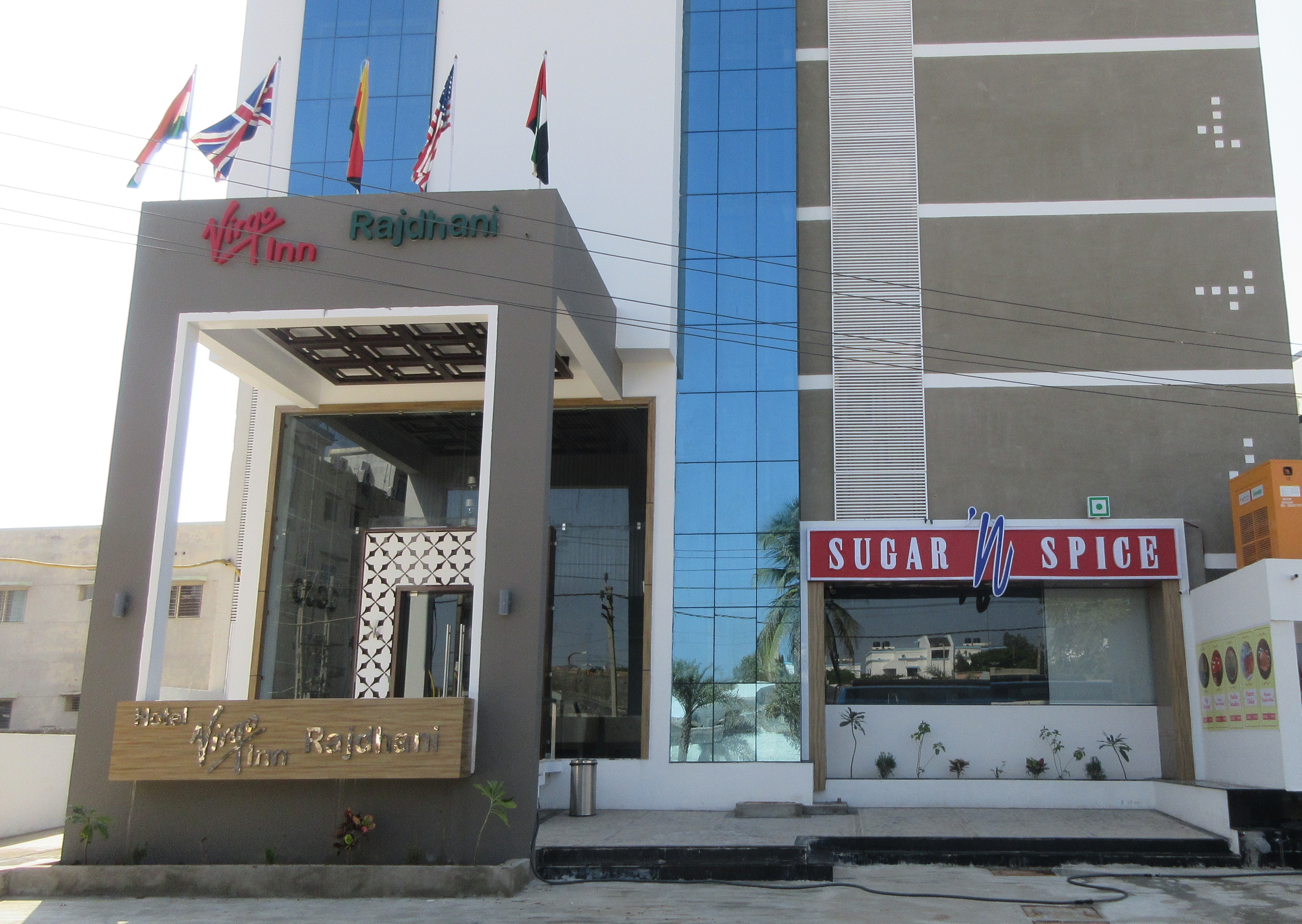 Hotel Rajdhani - Tap to explore photos