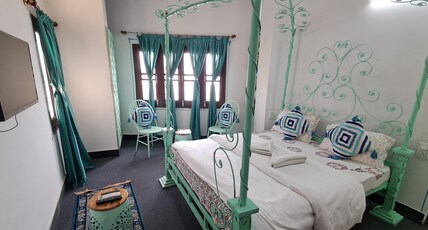Raahi Backpacker's Hostel |Rooftop Restaurant at Lake Pichola| Room Type - Superior Room with Hill View