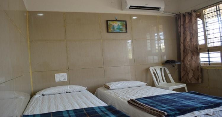 Mourya Deluxe A/C Lodge - Tap to explore photos