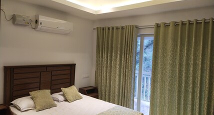 Riviera Inn Room Type - Premium River view  AC room With balcony