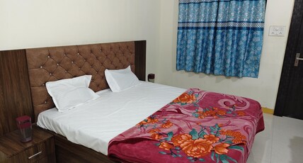 Shree dev kripa guest house Room Type - Bedroom 6 with hot water ( geyser)