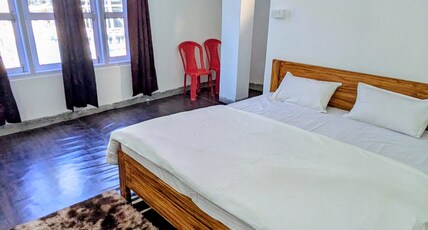 Accomoon hotels Room Type - Double bed deluxe with balcony/ hills view