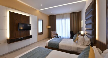 Clubhouse Hotel Morbi by CheckIn Room Type - Deluxe with Twin Bed
