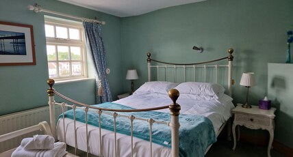 OYO The Leven Room Type - Deluxe Double Room