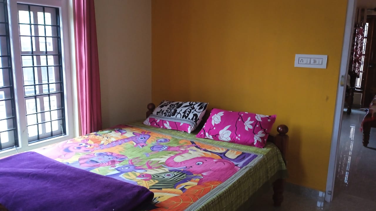 Booming glow Homestay - Tap to explore photos