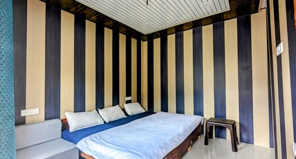 Triyugi Heights Room Type - Deluxe Room