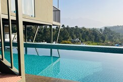 Western Ghats Holiday Homes | Mountain-view Rooms