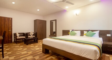Treebo Elite Plaza, 700 Mtrs From Madikeri Fort Room Type - Deluxe Family Room