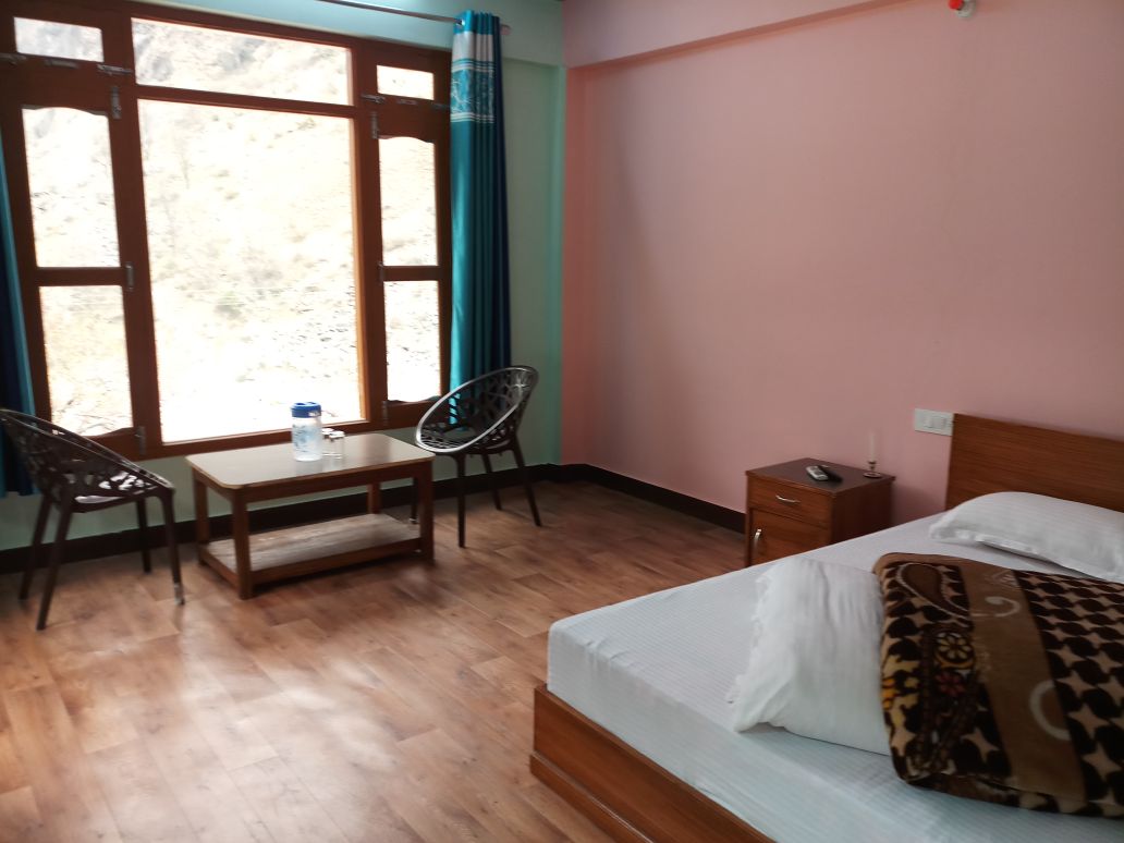 Ganga Resort | Mountain-view Rooms - Tap to explore photos