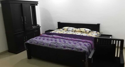Rain Home Stay | Artifical Rain Setup in Lush-green setting Room Type - Deluxe AC Plus