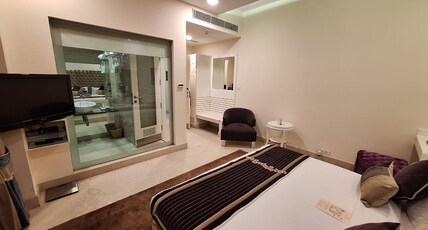 Hotel Eternity at Rajouri Garden Room Type - Super Deluxe (King Size Bed) With Smart TV