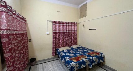 Vishwa Deva Home Stay Room Type - Standard Double Bed NON AC Room (Non-Attached Bathroom)
