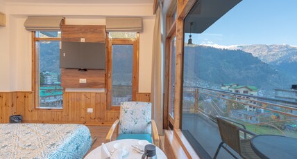 Snow Peak Retreat & Cottages (Centrally Heated- Hill View) Room Type - Super Deluxe Room- Air Conditioned-Centrally Heated | Balcony Snow Peak Retreat & Cottages (Centrally Heated- Hill View) Room Type - Super Deluxe Room- Air Conditioned-Centrally Heated | Balcony
