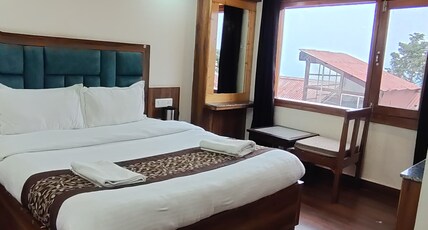 HOTEL PANKAJ Room Type - DELUXE WITH MOUNTAIN VIEW