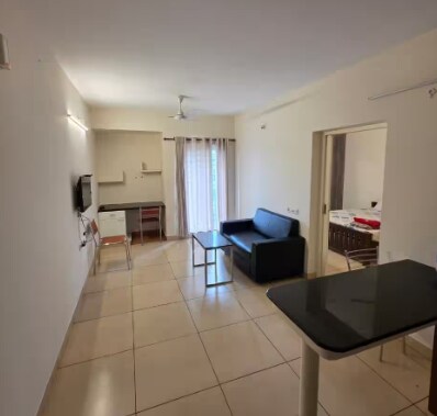 Amala Heights 1BHK Staycation - Tap to explore photos