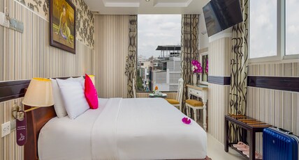 Pink Suite Saigon Airport Hotel Room Type - Pink Suite Luxury City View With Free Minibar Pink Suite Saigon Airport Hotel Room Type - Pink Suite Luxury City View With Free Minibar