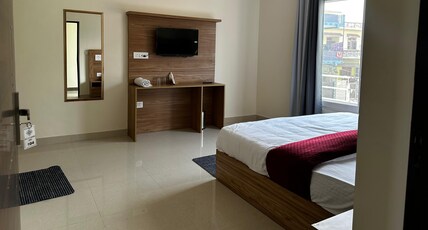 Blooming Inn @10min from Jolly Grant Airport Room Type - Deluxe Non AC Room with city view Blooming Inn @10min from Jolly Grant Airport Room Type - Deluxe Non AC Room with city view