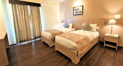 Starlit Suites Shirdi Room Type - Deluxe Two Bedroom Suite with Kitchenette Living Area and Balcony Starlit Suites Shirdi Room Type - Deluxe Two Bedroom Suite with Kitchenette Living Area and Balcony