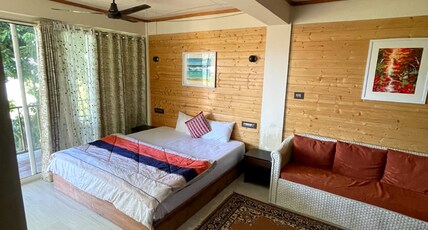 Titos homestays Room Type - Super Deluxe Room with Private Balcony