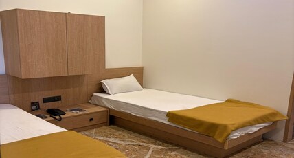 Manoranjan Enclave Room Type - Deluxe Room (Twin Bed)