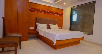 Hotel Ravee Exotica Room Type - Deluxe AC Room (Guest age should be 19 years and above)