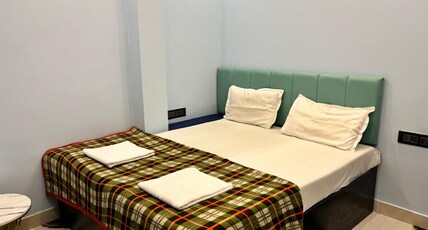 Holy City Inn | Near Assi Ghat Room Type - Deluxe Double  Room