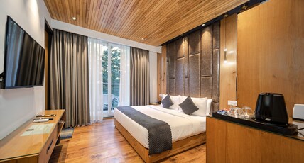 Moksha Riverside Room Type - Deluxe River Facing with Balcony