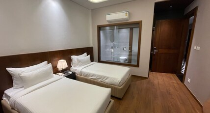Hotel Pradoe - (Opp Mittal Mall) Room Type - Corporate Room - Twin Bed Hotel Pradoe - (Opp Mittal Mall) Room Type - Corporate Room - Twin Bed