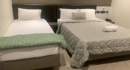 MAS RESIDENCY Room Type - Deluxe Triple Room MAS RESIDENCY Room Type - Deluxe Triple Room