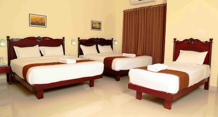 Hotel Temple Citi Room Type - Deluxe AC Five Bed Room Hotel Temple Citi Room Type - Deluxe AC Five Bed Room