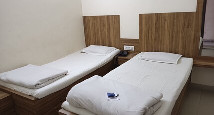 HOTEL TULSI PVT LTD Room Type - STANDARD ROOM