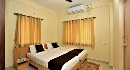 Three Points Residency Room Type - Deluxe AC Room