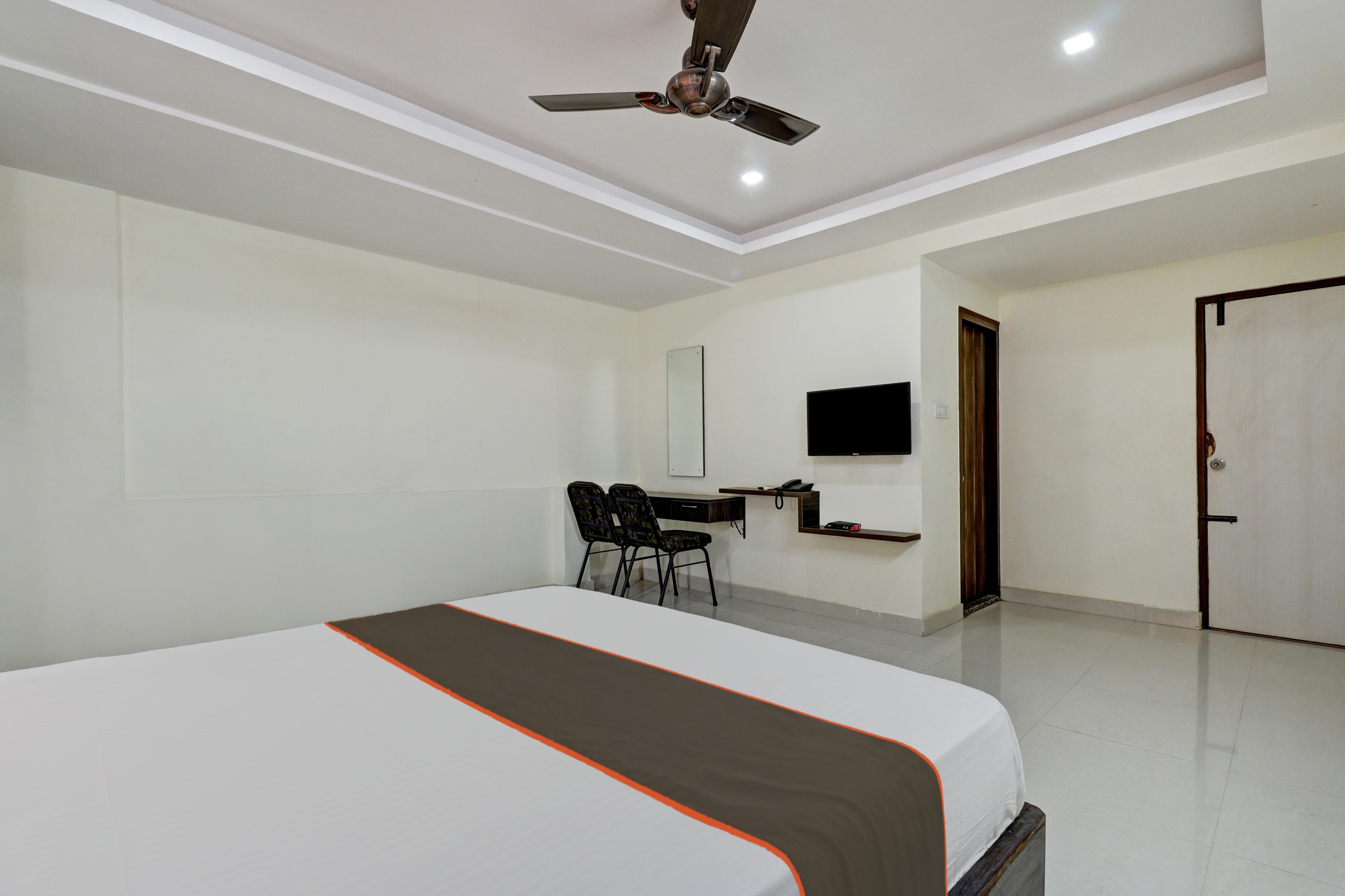 Hotel O Sapthagiri Suites Inn - Tap to explore photos