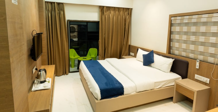 Hotel Vrinda - Tap to explore photos