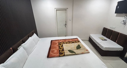 Hotel Maa Parwati Palace Room Type - Three Bed Ac Room Hotel Maa Parwati Palace Room Type - Three Bed Ac Room