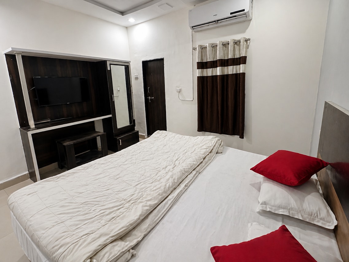 Hotel Tushar - Tap to explore photos