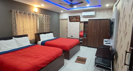SHREE MAHALAKSHMI RESIDENCY Room Type - Deluxe Four Bed room