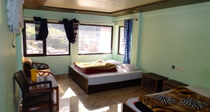 hotel nanda devi badrinath Room Type - Deluxe Triple Sharing Room