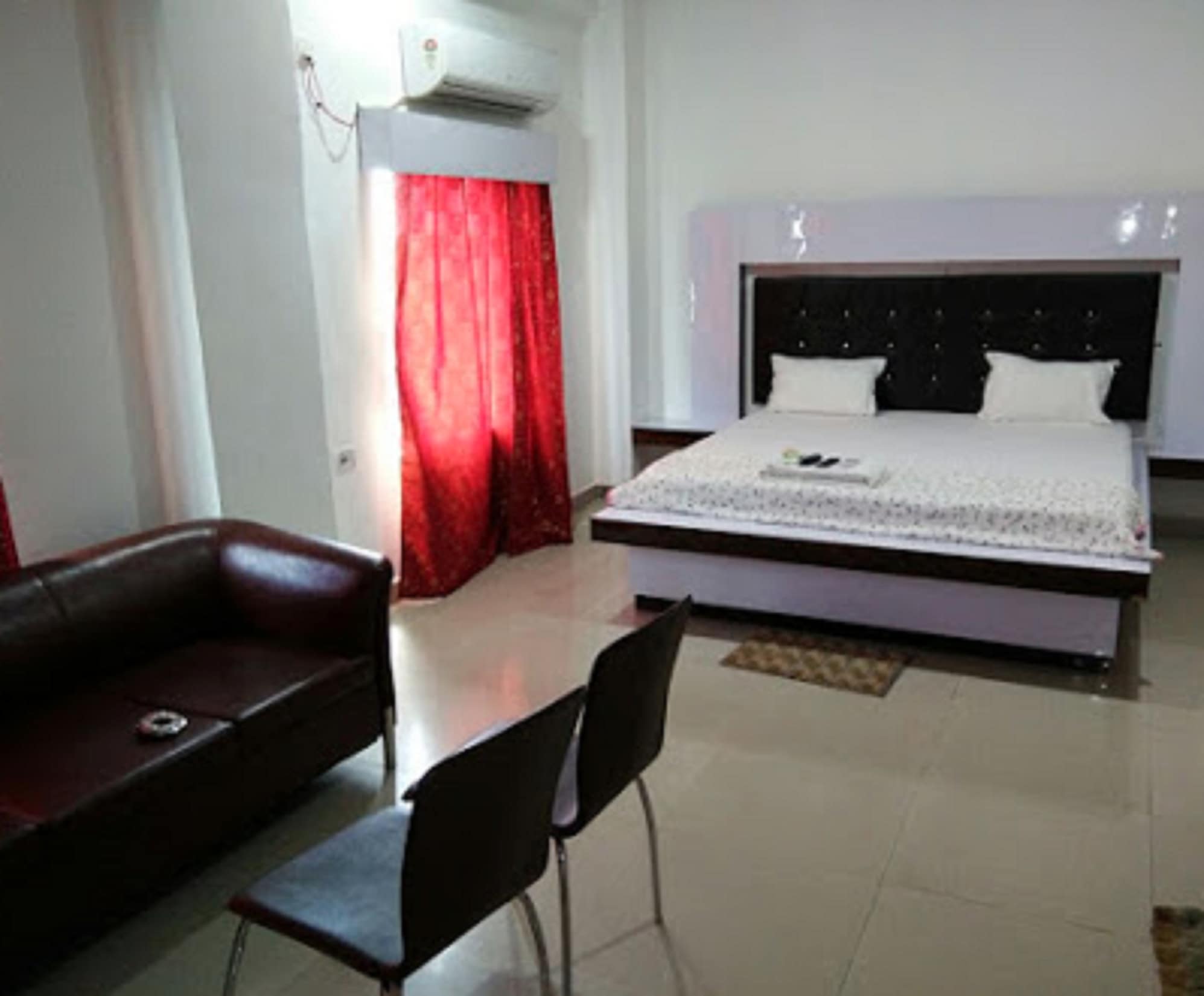 Hotel Sri Sai International - Tap to explore photos