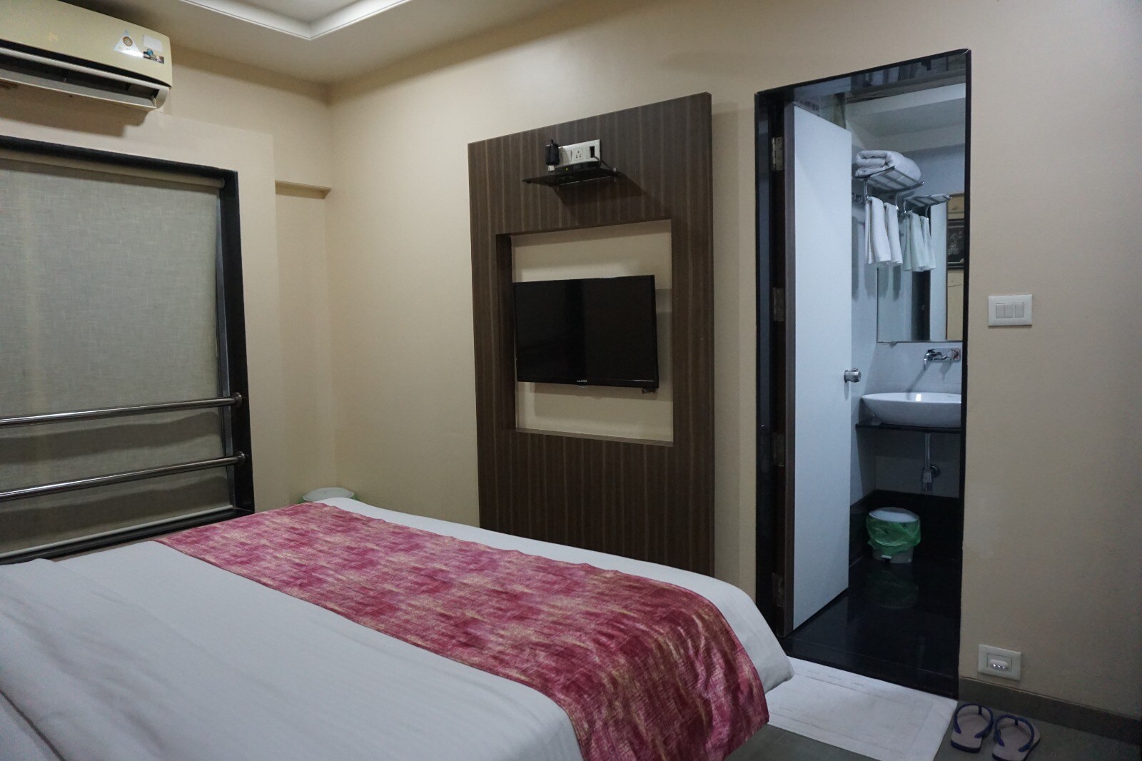 Hotel Yash Executive - Tap to explore photos