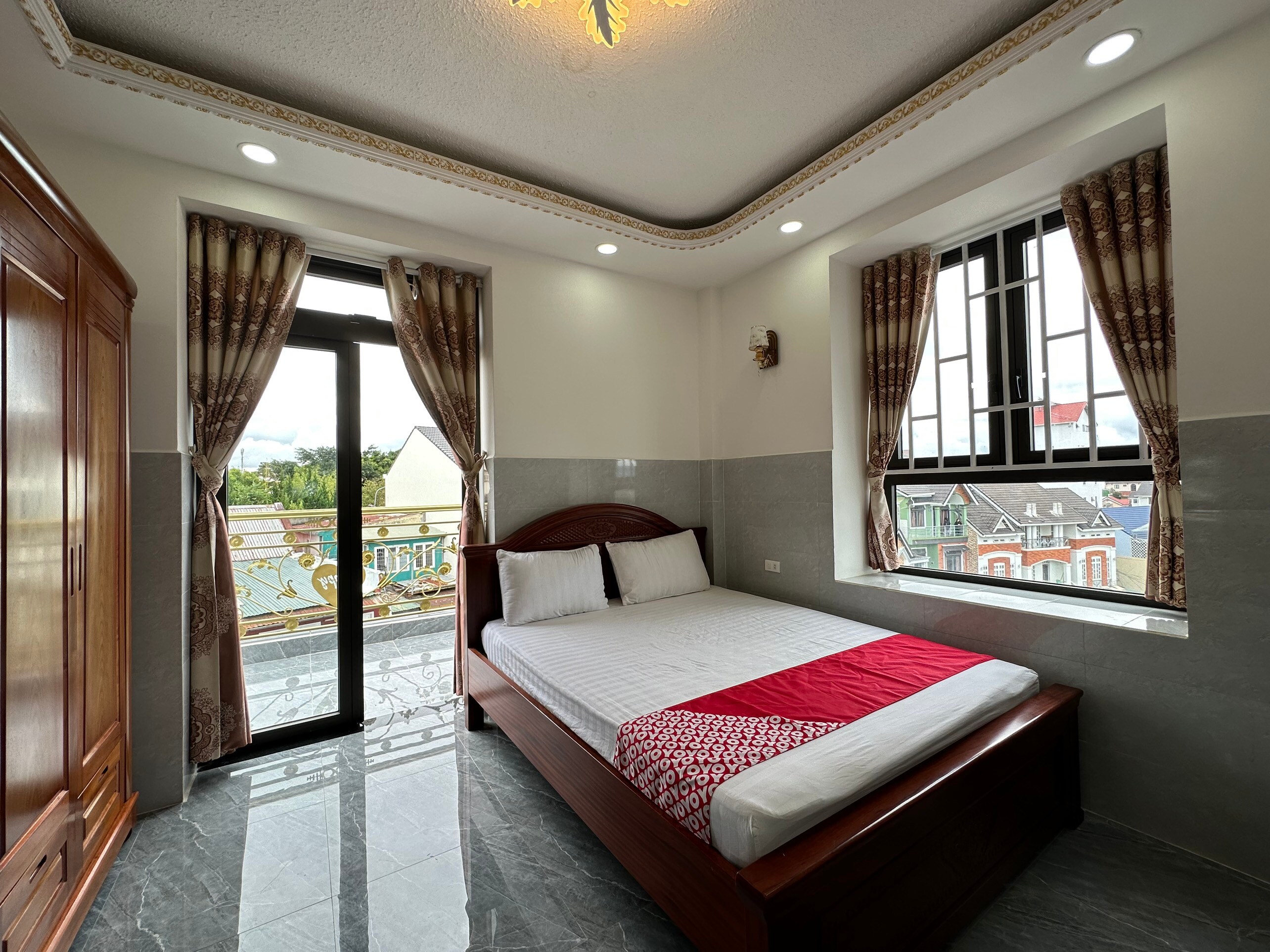 OYO 1211 Happy Hotel & Apartment - Tap to explore photos