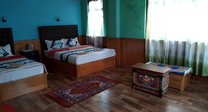 Monomita Residency(Monomita Hotels) Room Type - Deluxe Triple