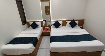 SOMTIRTH HOTEL Room Type - THREE BED ROOM