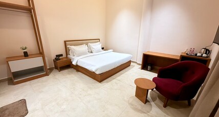 Pushpak Farms Room Type - Deluxe Room with Balcony and Pool View