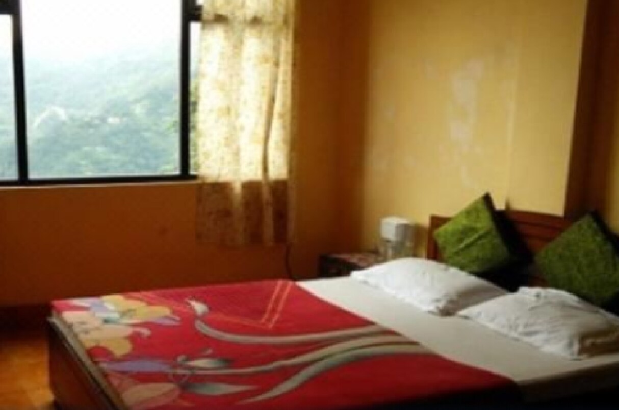 Hotel Dzongsar - Tap to explore photos