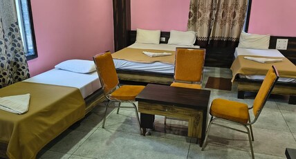 HOTEL OM GRAND AND OM CONVENTION Room Type - SUITE AC ROOM