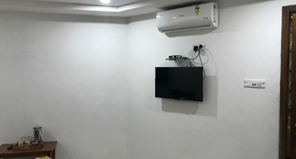 Shakti Residency Room Type - Double Deluxe Bedroom