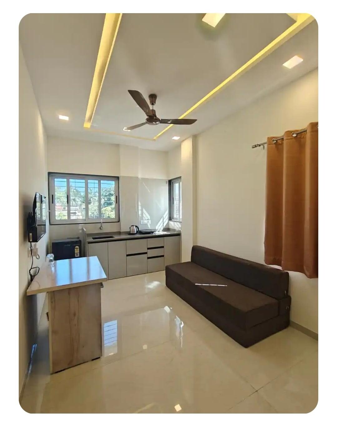 46 ELITE ENCLAVE - 1BHK Modern Service Apartments - Tap to explore photos