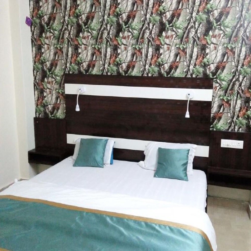 Inn Residency | AC Rooms & Wifi - Tap to explore photos