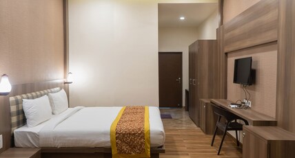 HOTEL THE GRAND RADHE SHYAM Room Type - DELUXE ROOM